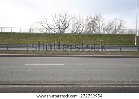 View of crash barrier on highway