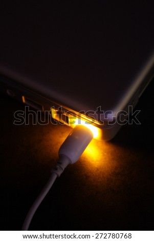 Close up of computer charger plug