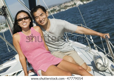 Asian Couple Sailing