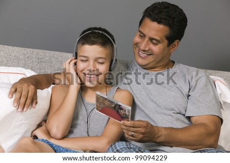 Father and Son Listening to Music