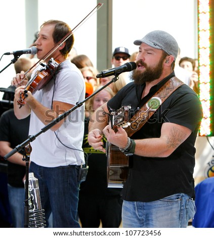 NEW YORK-JULY 13: Jimmy De Martini (left) and Zac Brown perform on the Today Show at Rockefeller Plaza on July 13, 2012 in New York City.