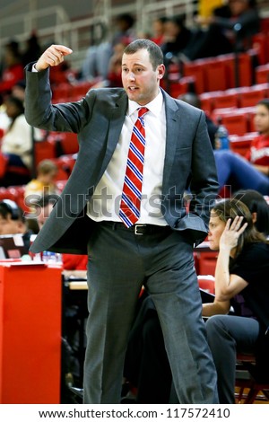 NEW YORK-NOV 3: St. John\'s Red Storm head coach John Tartamella on the sideslines against the Farmingdale Rams at Carnesecca Arena on November 3, 2012 in Jamaica, Queens, New York York.
