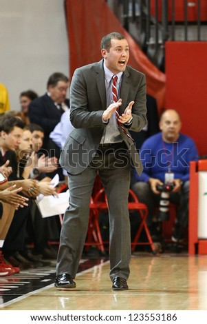 JAMAICA, NY-JAN 2: St. John\'s Red Storm head coach Joe Tartamella reacts on the sidelines against the Delaware Blue Hens at Carnesecca Arena on January 2, 2013 in Jamaica, Queens, New York.