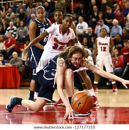 JAMAICA-FEB 2: Connecticut Huskies forward Breanna Stewart (30) and St. John\'s Red Storm guard Shenneika Smith (35) battle for the ball at Carnesecca Arena on February 2, 2013 in Jamaica, New York.