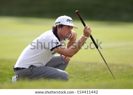 Sep 15, 2013; Lake Forest, IL, USA; Keegan Bradley reads the 18th green during the third round of the BMW Championship at Conway Farms Golf Club.