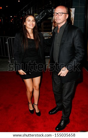 NEW YORK-SEP 18: Actor Paul Haggis and guest attend the Ferrari & The Cinema Society screening of \'Rush\' at Chelsea Clearview Cinema on September 18, 2013 in New York City.