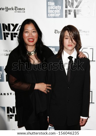 NEW YORK-SEP 27: Executive Director at Film Society of Lincoln Center Rose Kuo and son Justin attend the \