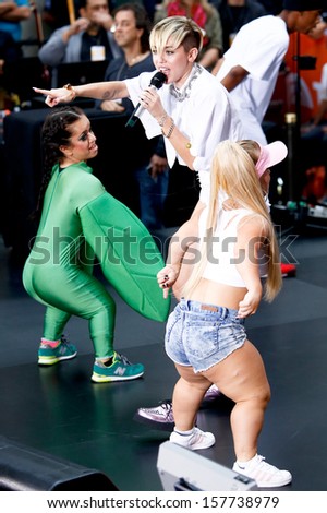 NEW YORK-OCT 7 Recording artist Miley Cyrus performs on NBC's Today Show at Rockefeller Plaza on October 7 2013 in New York City NEW YORK-OCT 7 Recording artist Miley Cyrus performs on NBC's Today Show at Rockefeller Plaza on October 7 2013 in New York City