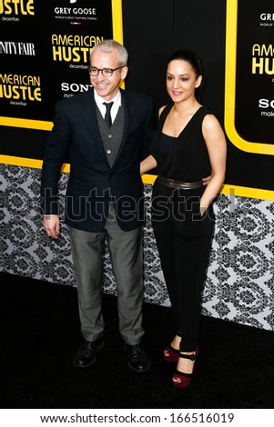 NEW YORK-DEC 8:  Entertainment Weekly editor Jess Cagle (L) and actress Archie Punjabi attend the \