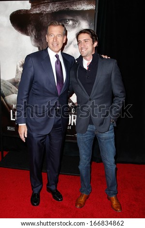NEW YORK-DEC 3: TV news anchor Brian Williams (L) and guest attend the premiere of \