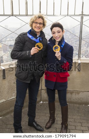 NEW YORK-FEB 27: 2014 Sochi Winter Olympics Champions  Ice Dancers Charlie White and  Meryl Davis (R) visit The Empire State Building on February 27, 2014 in New York City.