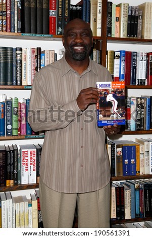 HUNTINGTON, NY-MAY 2: Former MLB player Mookie Wilson signs his book \'Mookie: Life, Baseball, and the \'86 Mets\' at The Book Revue on May 2, 2014 in Huntington, NY.