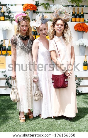 JERSEY CITY, NJ-MAY 31: (L-R) Kate Greer, Margot and Cleo Wade attend the 7th Annual Veuve Cliquot Polo Classic at Liberty State Park on May 31, 2014 in Jersey City, NJ.