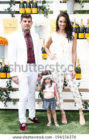 JERSEY CITY, NJ-MAY 31: Designer Eli Mazrahi (L) and Shanina Shaik attend the 7th Annual Veuve Cliquot Polo Classic at Liberty State Park on May 31, 2014 in Jersey City, NJ.