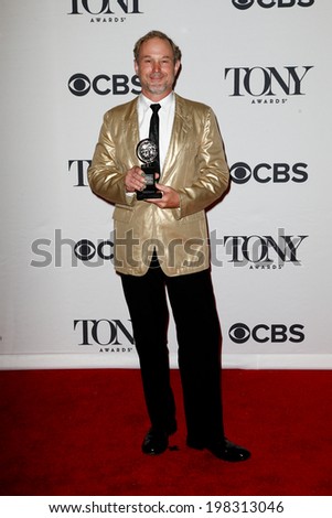 NEW YORK-JUNE 8: Lighting designer Kevin Adams poses in the press room at the American Theatre Wing's 68th Annual Tony Awards at Radio City Music Hall on June 8, 2014 in New York City.