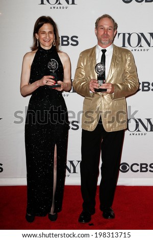 NEW YORK-JUNE 8: Lighting designers Natasha Katz (L) and Kevin Adams pose at American Theatre Wing\'s 68th Annual Tony Awards at Radio City Music Hall on June 8, 2014 in New York City.