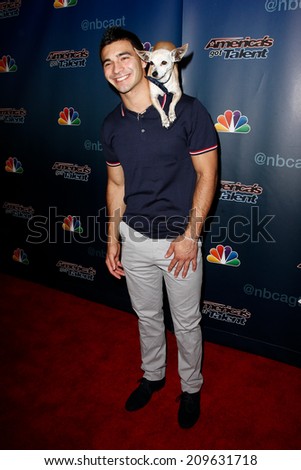 NEW YORK-AUG 6: Christian Stoinev and his dog Scooby attend the 'America's Got Talent' post show red carpet at Radio City Music Hall on August 6, 2014 in New York City.