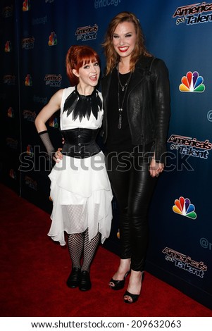 NEW YORK-AUG 6: Rock violinist Lindsey Stirling (L) and singer Lzzy Hale of Halestorm attend \'America\'s Got Talent\' post show red carpet at Radio City Music Hall on August 6, 2014 in New York City.