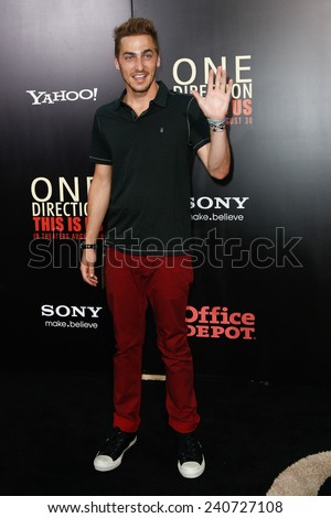 NEW YORK-AUG 26: Singer Kendall Schmidt of Big Time Rush attends the New York premiere of \'One Direction: This Is Us\' at the Ziegfeld Theater on August 26, 2013 in New York City.