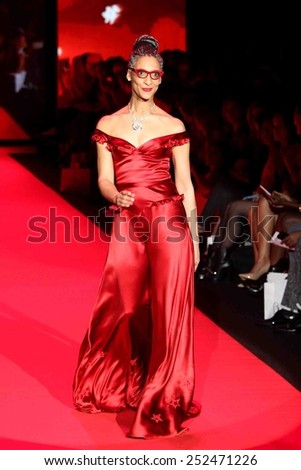 NEW YORK-FEB 12: Chef Carla Hall wears Evgenia at Go Red for Women - The Heart Truth Red Dress Collection during Mercedes-Benz Fashion Week at Lincoln Center on February 12, 2015 in New York City.