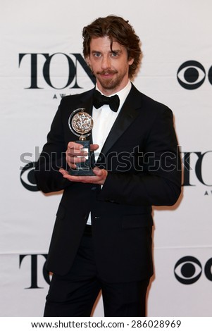 NEW YORK-JUN 7: Actor Christian Borle holds the trophy at the American Theatre Wing\'s 69th Annual Tony Awards at Radio City Music Hall on June 7, 2015 in New York City.