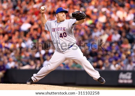 DENVER-AUG 21: New York Mets pitcher Bartolo Colon pitches during a game against the Colorado Rockies at Coors Field on August 21, 2015 in Denver, Colorado.