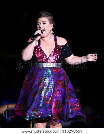 HOLMDEL, NJ-JUL 14: Recording artist Kelly Clarkson performs during her \'Piece by Piece\' Tour at PNC Bank Arts Center on July 14, 2015 in Holmdel, New Jersey.