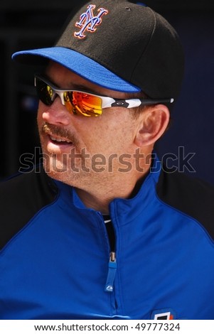 PORT ST. LUCIE, FLORIDA - MARCH 23: New York Mets hitting instruction Howard Johnson looks outside of the dugout before a game against the Atlanta Braves on March 23, 2010 in Port St. Lucie, Florida.