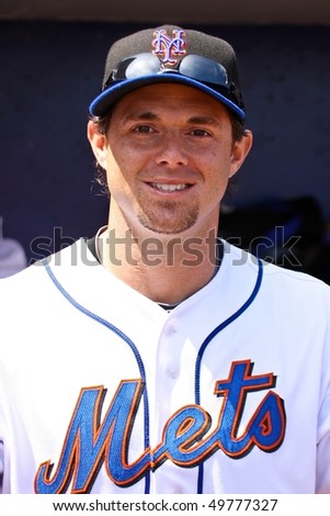 PORT ST. LUCIE, FLORIDA - MARCH 23: New York Mets outfielder Frank Catalonotta takes a look outside of the dugout before a game against the Atlanta Braves on March 23, 2010 in Port St. Lucie, Florida.
