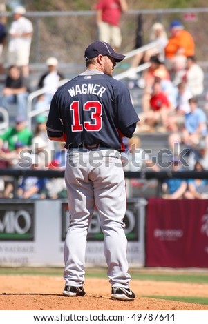 PORT ST. LUCIE, FLORIDA - MARCH 23: Atlanta Braves pitcher Billy Wagner gets set during a spring training game against the NY Mets in Port St. Lucie, FL on March 23, 2010.