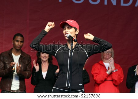 NEW YORK - MAY 1: Actress Halle Berry attends the 13th Annual Entertainment Industry  Foundation Revlon Run/Walk for Women at Times Square on May 1, 2010 in New York City.