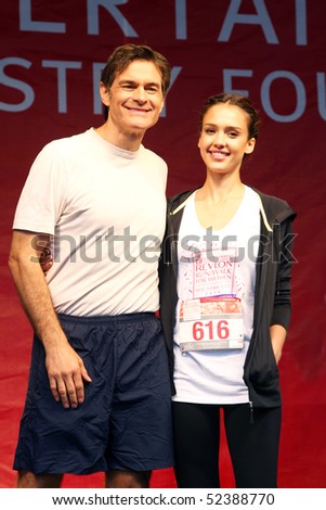 NEW YORK - MAY 1: Dr. Mehmet Oz and Jessica Alba attend the 13th Annual Entertainment Industry Foundation Revlon Run/Walk for Women in Times Square on May 1, 2010 in New York City.