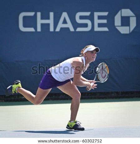 FLUSHING, NY - SEPTEMBER 2: Melanie Oudin returns a volley during her women\'s doubles match at the US Open at the Billie Jean National Tennis Center on September 2, 2010 in Flushing, NY.