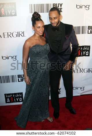 NEW YORK - SEPTEMBER 30: Singer Alicia Keys attends the Keep A Child Alive's Black Ball at the Hammerstein Ballroom with her husband, Swizz Beatz, on September 30, 2010 in New York City.