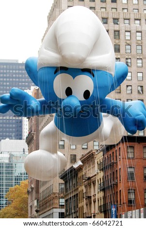 NEW YORK - NOVEMBER 25: The Smurf float appears in the 84th Macy\'s Thanksgiving Day Parade on November 25, 2010 in New York City.