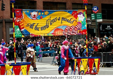 NEW YORK - NOVEMBER 25: A banner appears in the 84th Macy\'s Thanksgiving Day Parade on November 25, 2010 in New York City.