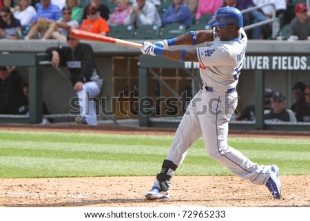 SCOTTSDALE, AZ - MARCH 7: Los Angeles Dodgers outfielder Trayvon Robinson takes a swing against the Colorado Rockies at Salt River Fields at Talking Stick on March 7, 2011 in Scottsdale, AZ.