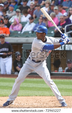 SCOTTSDALE, AZ - MARCH 7: Los Angeles Dodgers outfielder Eugenio Velez takes a swing against the Colorado Rockies at Salt River Fields at Talking Stick on March 7, 2011 in Scottsdale, AZ.