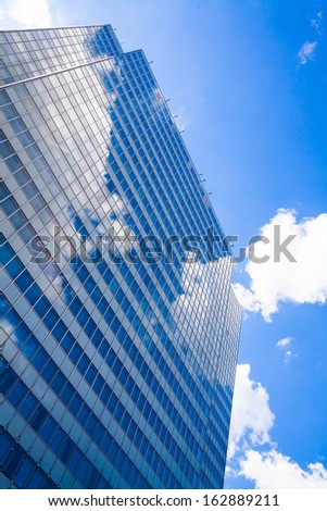 Abstract building. blue glass wall of skyscraper