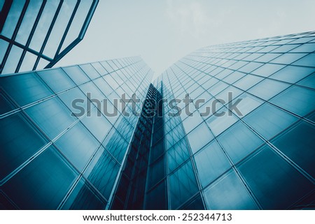 Blue skyscraper facade. office buildings. modern glass silhouettes of skyscrapers