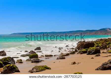 Algarve, Portugal, Europe.  Atlantic coast.  ocean waves of Atlantic Ocean