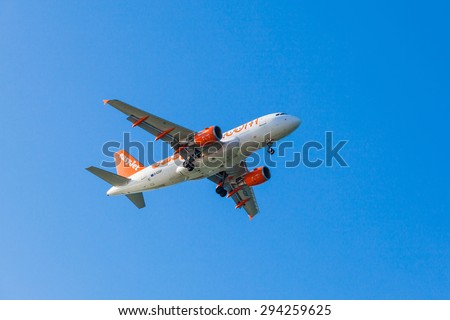 FARO,PORTUGAL-MAY 09:EasyJet Airline Airbus A319 arrives to the Faro International Airport, May 09, 2015 in Faro, Portugal. Easyjet had 145 A319\'s in service