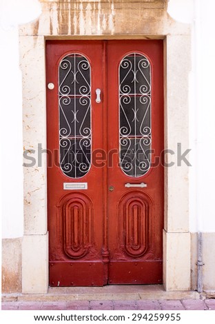 entrance door in front of residential house.  wooden door