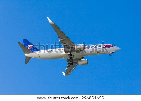 FARO,PORTUGAL-MAY 09: Trave Service Boeing B737 lands at  Faro International Airport, May 09, 2015 in Faro, Portugal. Travel Service is the largest private airline company in the Czech Republic.