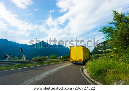truck on road. cargo transportation.  Yellow truck