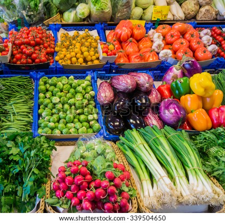 market with various colorful fresh fruits and vegetables. Farmers market. Fresh vegetables on shelf in supermarket