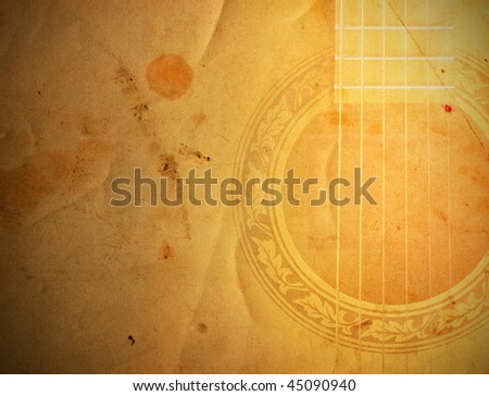 Guitar pictured on old paper