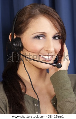 Girl blue background computer headset, phone