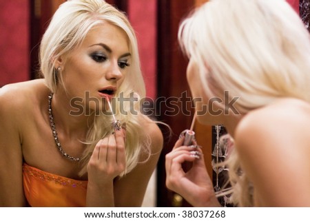 Young woman preparing for a party