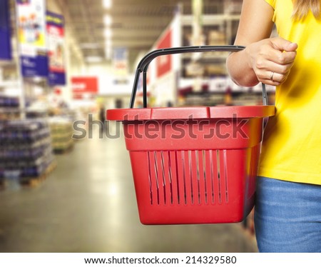 Women holding empty shopping basket - Shopping concept
